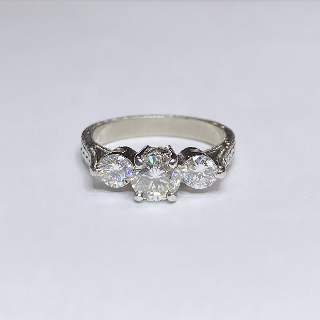 1 1/10ctw Round Three Stone Platinum Ring