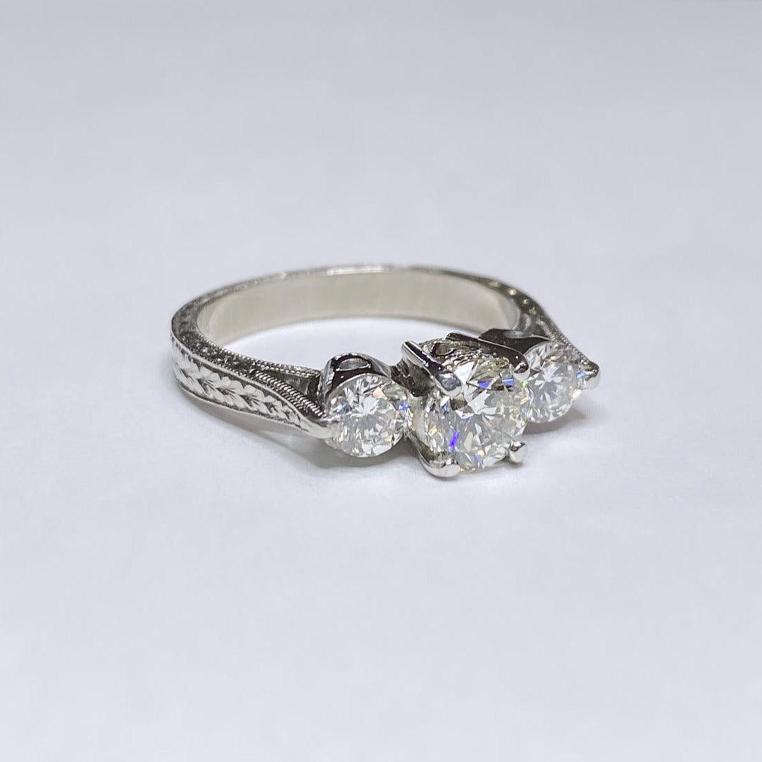 1 1/10ctw Round Three Stone Platinum Ring