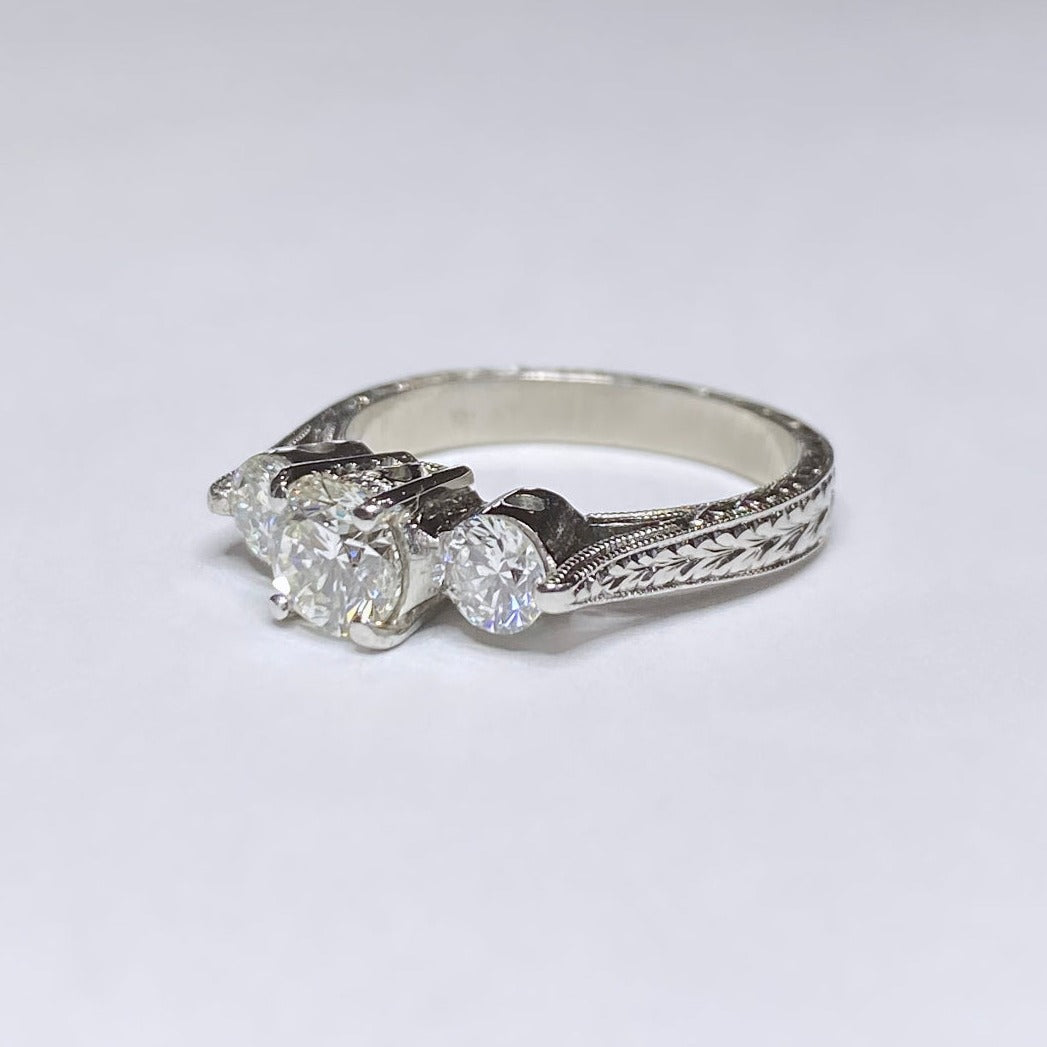 1 1/10ctw Round Three Stone Platinum Ring