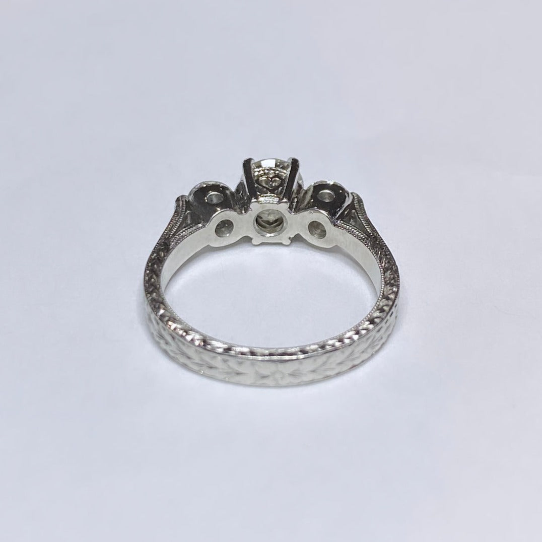 1 1/10ctw Round Three Stone Platinum Ring