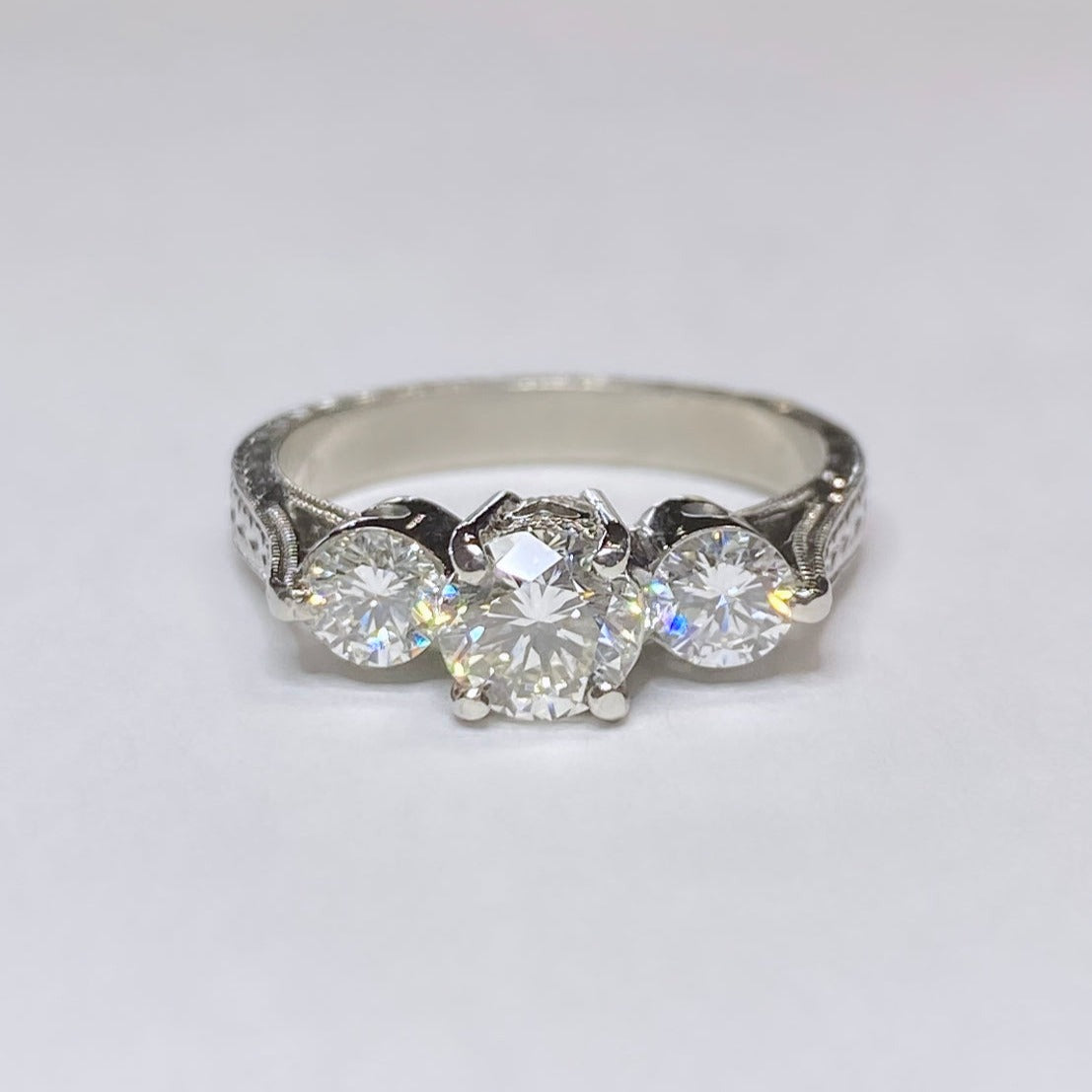 1 1/10ctw Round Three Stone Platinum Ring