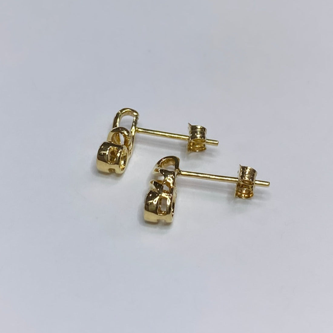 14k 1/6tcw Diamond Swirl Earrings