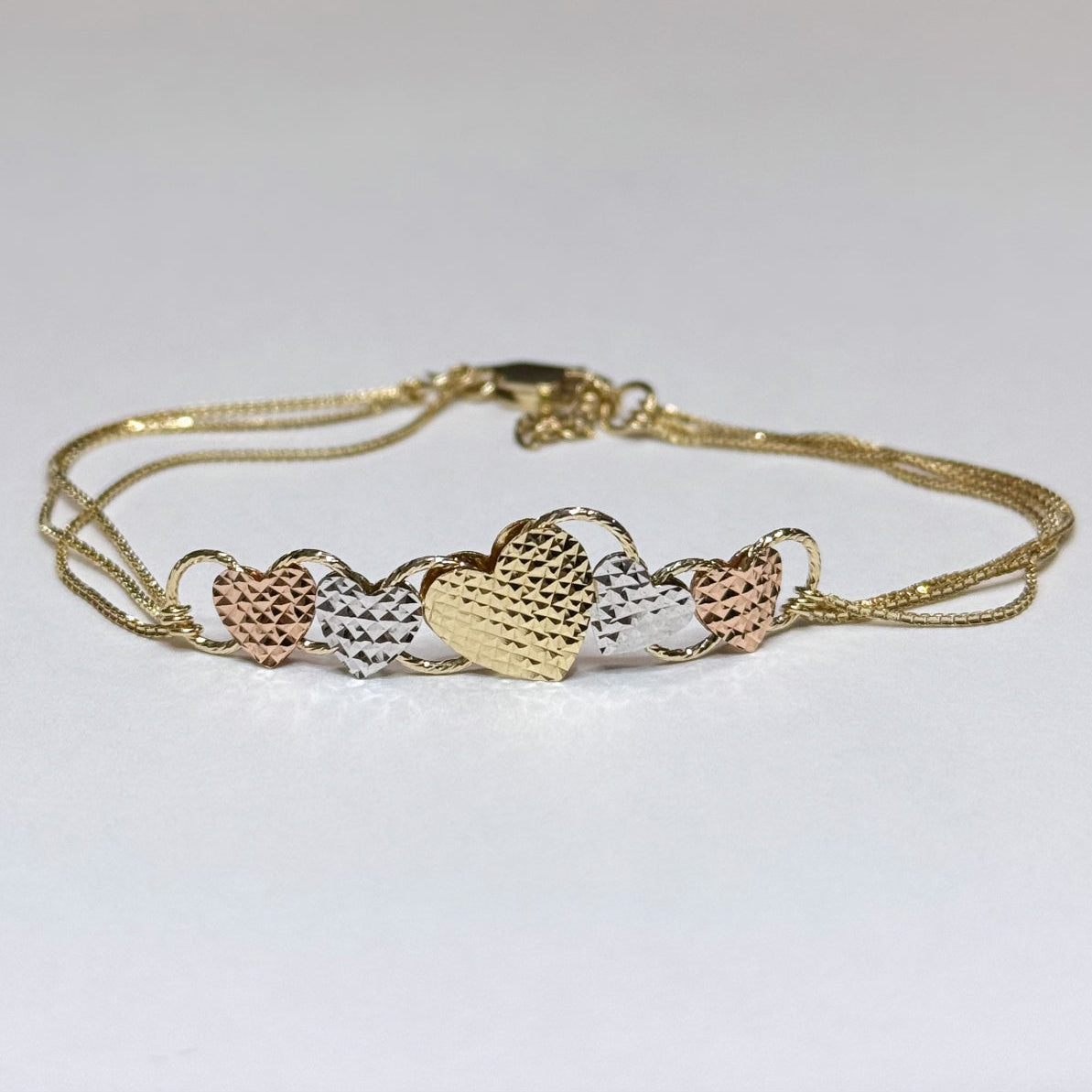 14k Tricolor Reversible Hearts Bracelet