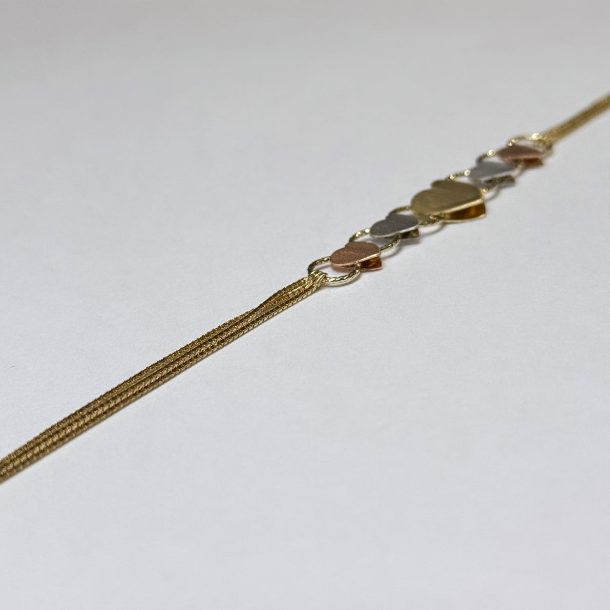 14k Tricolor Reversible Hearts Bracelet