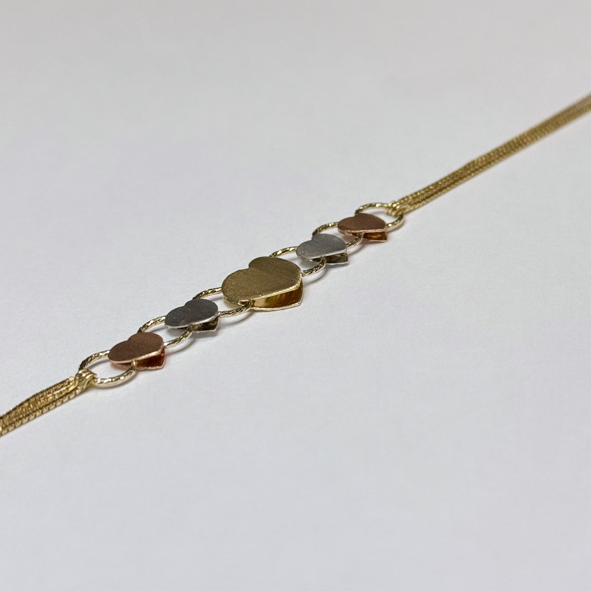 14k Tricolor Reversible Hearts Bracelet