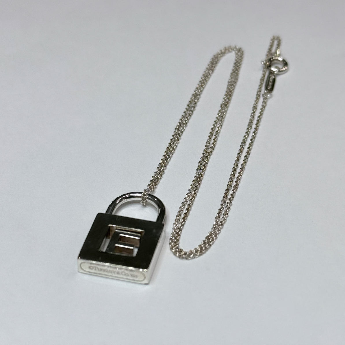 T & Co. 925 Initial "E" Lock Necklace