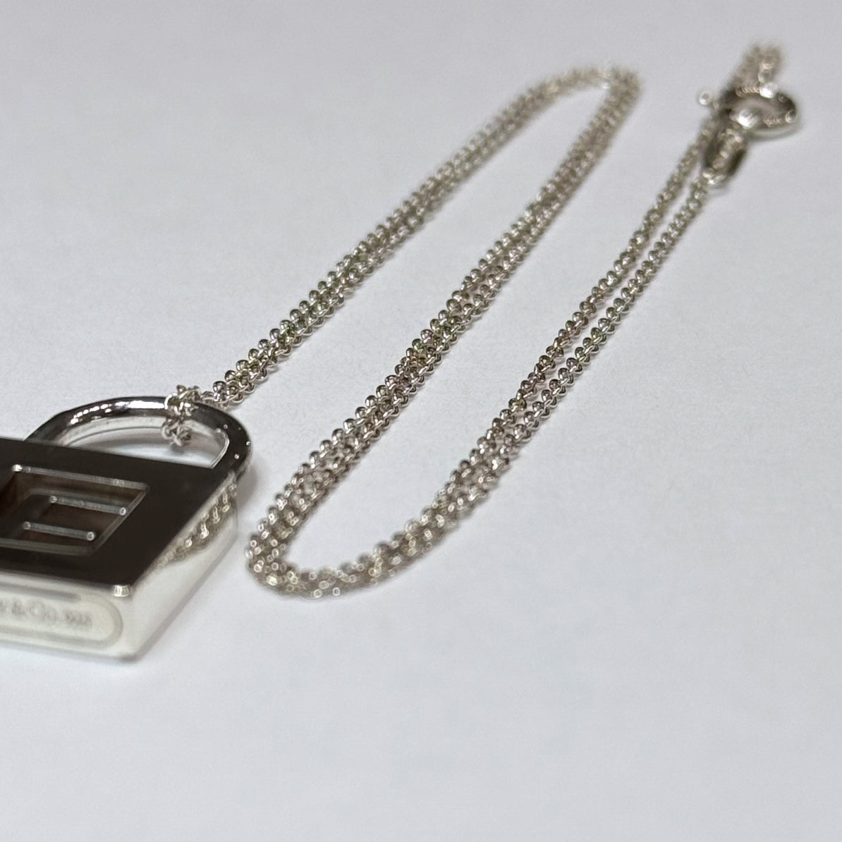 T & Co. 925 Initial "E" Lock Necklace