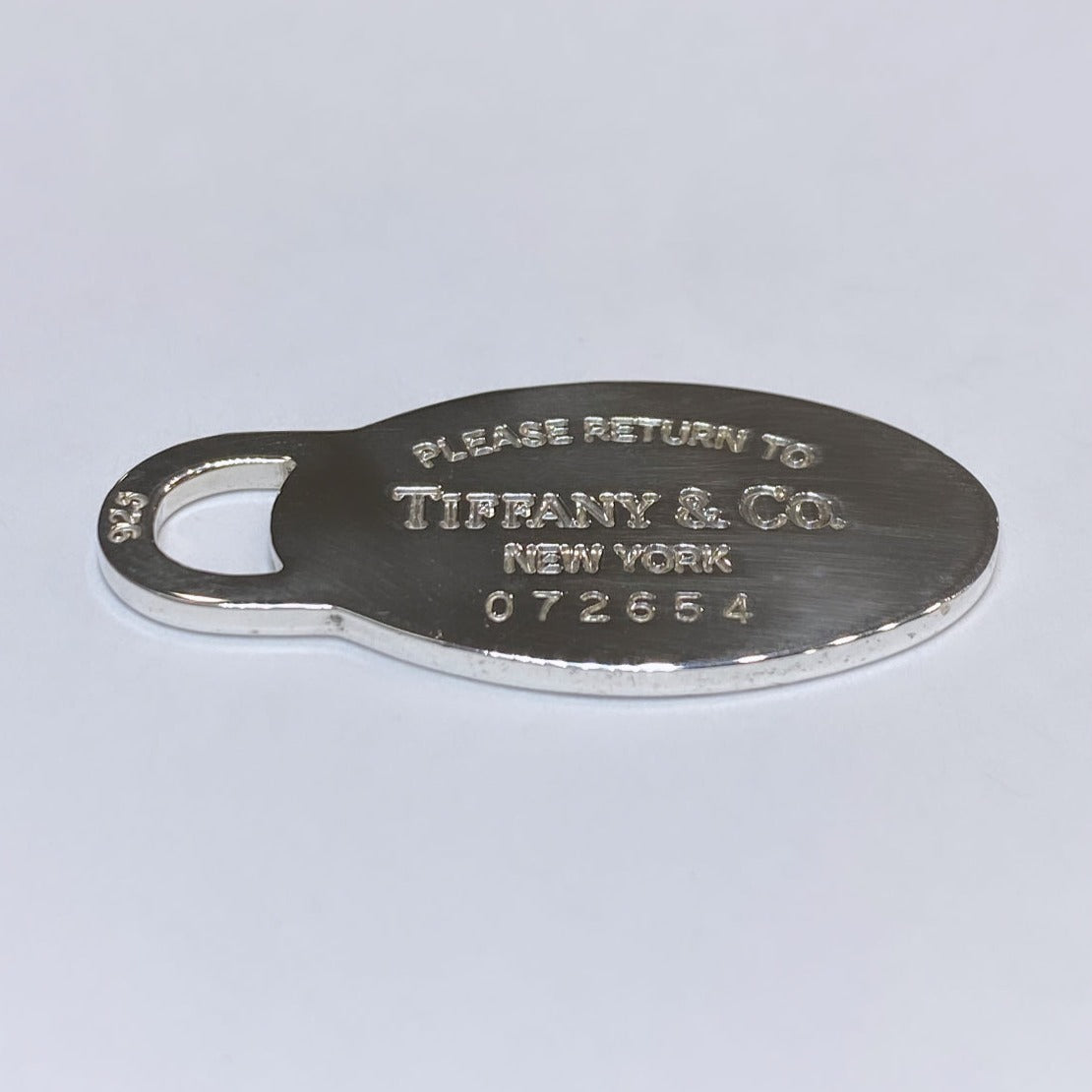 T & Co. 925 Please Return To Tiffany & Co. Oval Charm