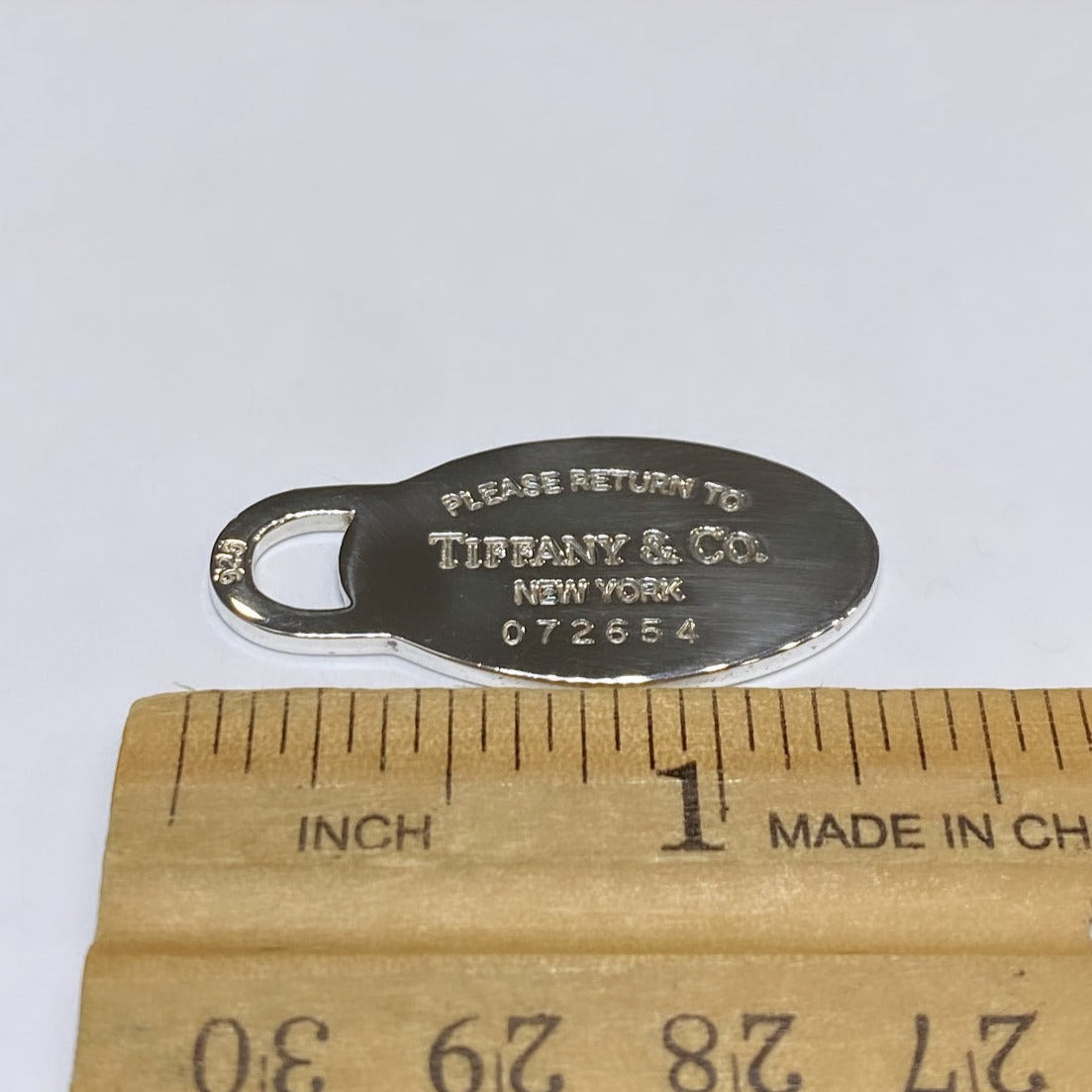 T & Co. 925 Please Return To Tiffany & Co. Oval Charm